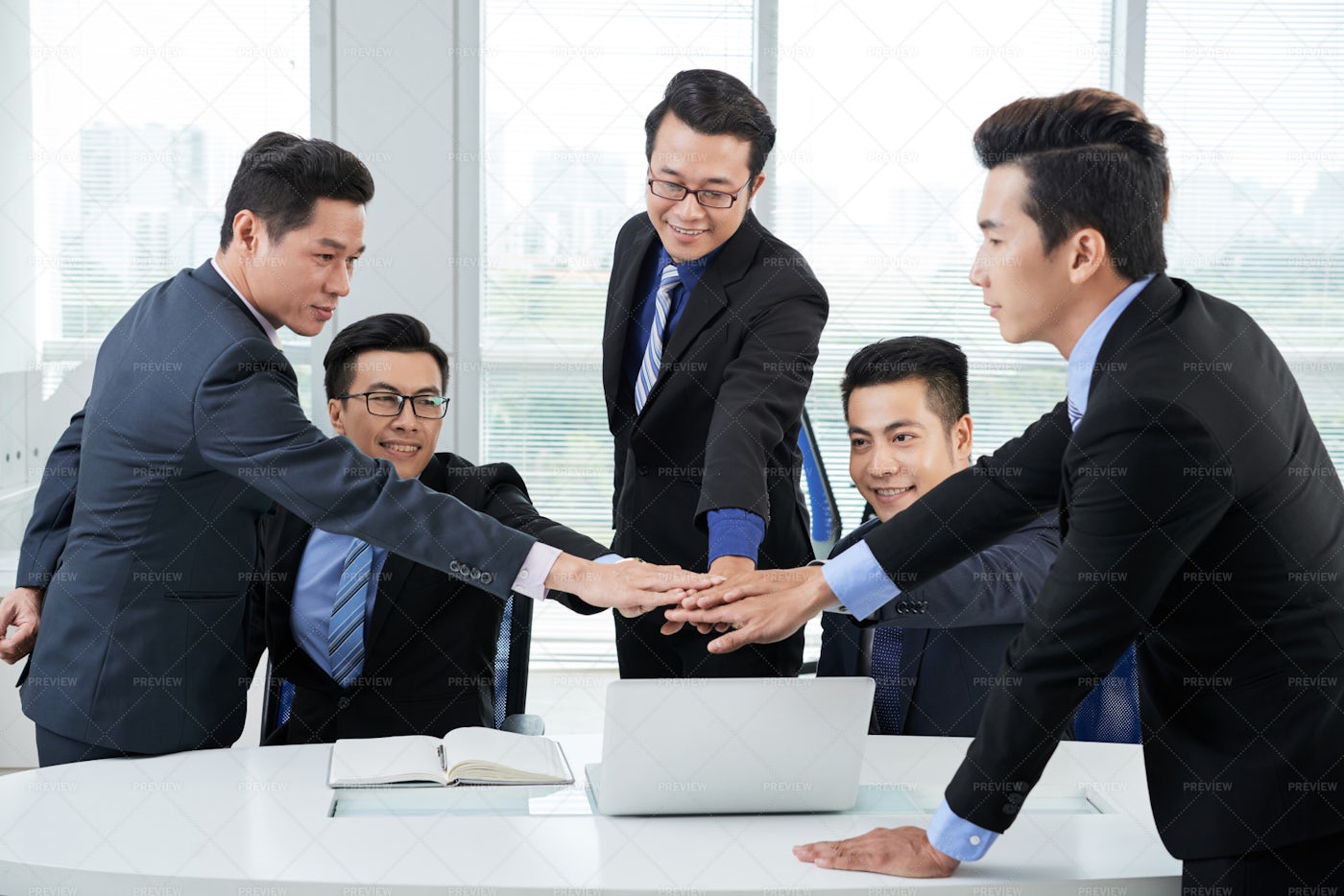 Working Meeting Of Asian Colleagues: Stock Photos