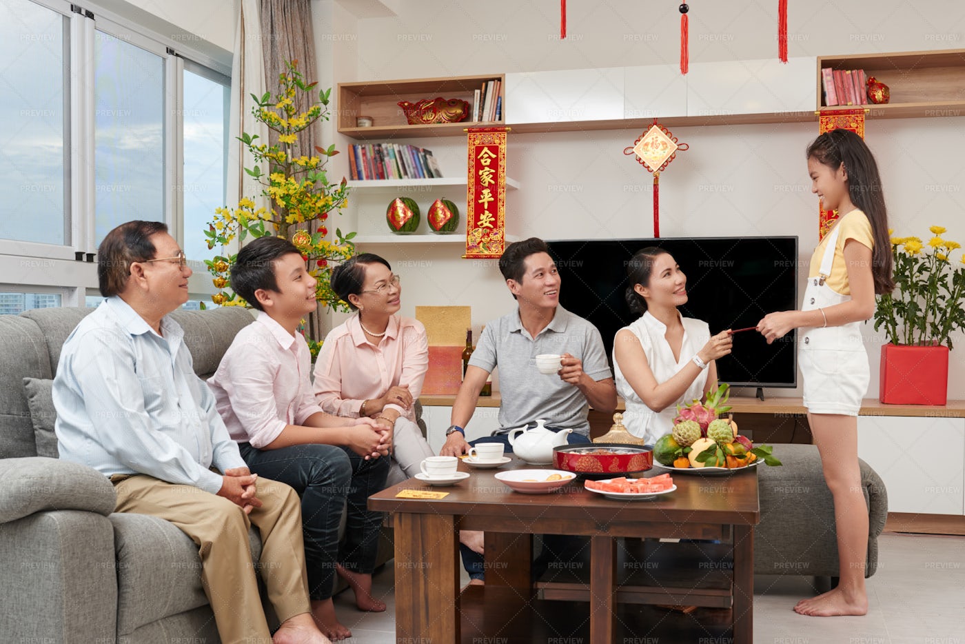 Asian Family Celebrating Tet: Stock Photos