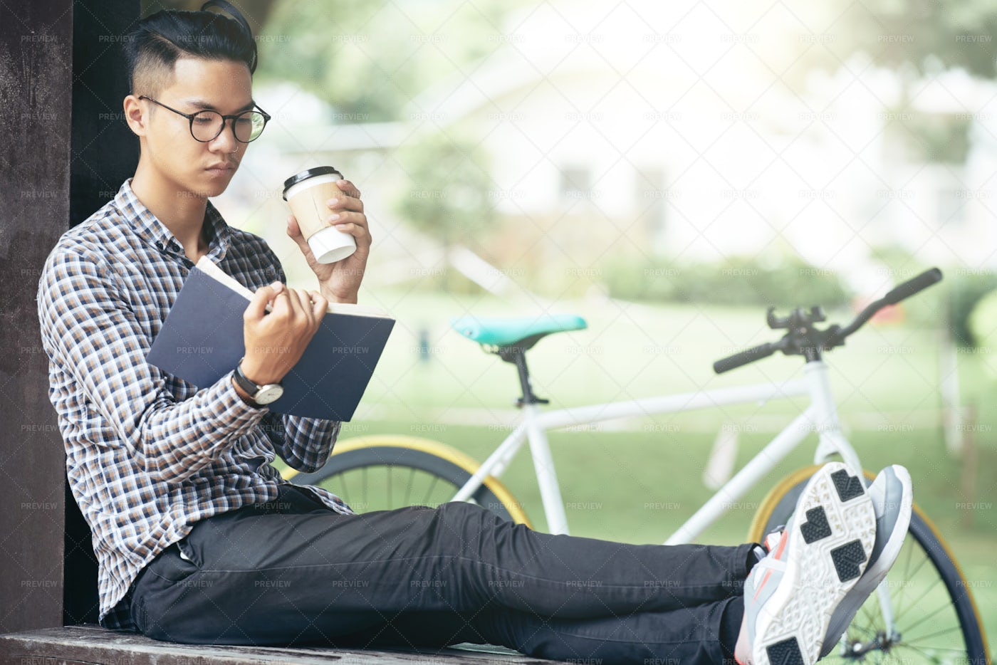 Man Reading Book Outdoors: Stock Photos