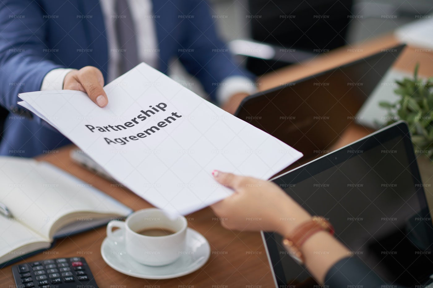 Signing Partnership Agreement: Stock Photos