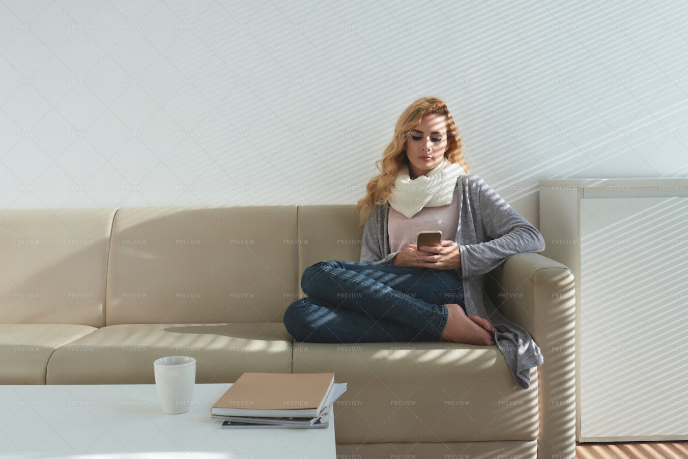 Pretty Woman Resting On Sofa: Stock Photos