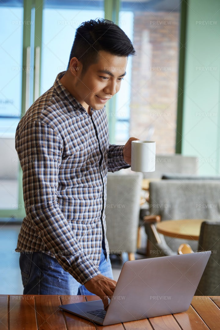 Connecting His Laptop To Internet: Stock Photos