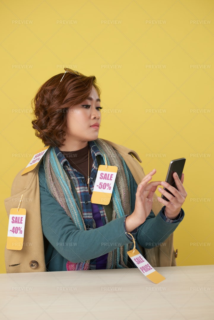 Shopaholic On The Phone: Stock Photos