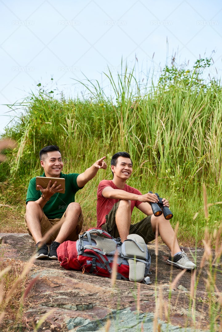 Friends Resting On Mountain: Stock Photos