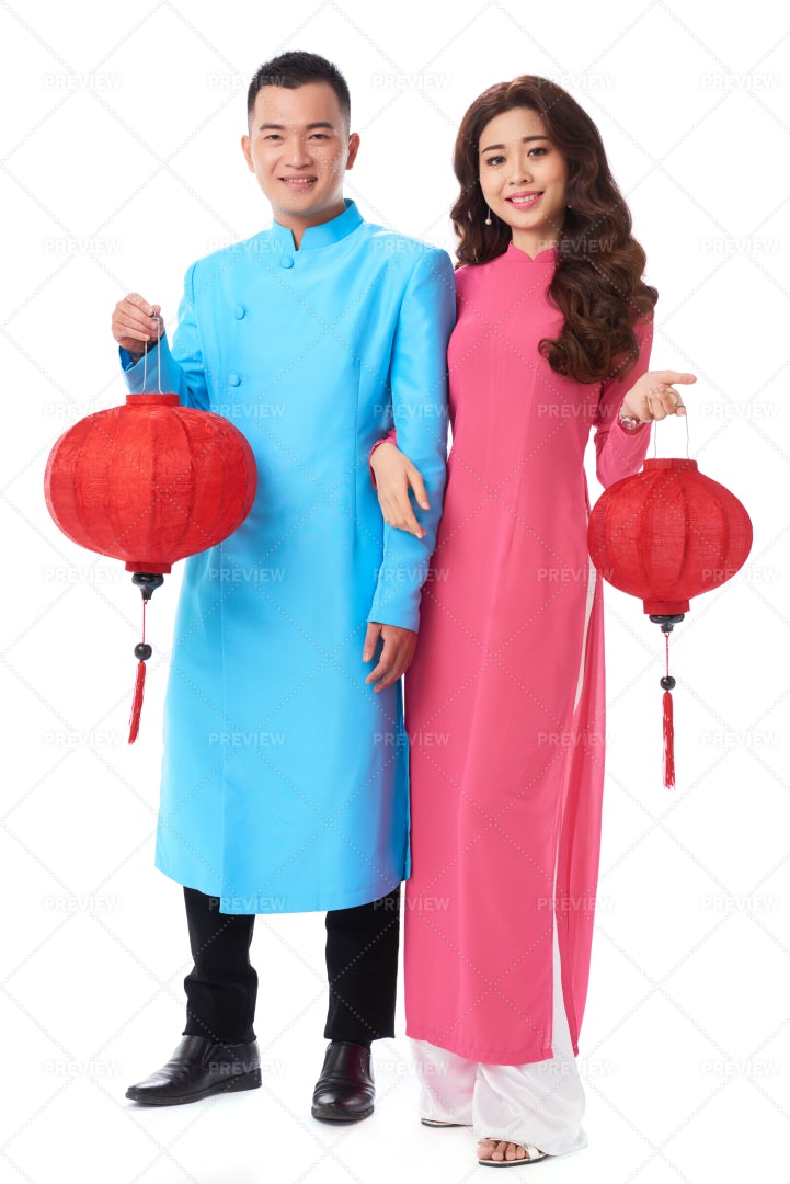 Couple With Tet Decorations: Stock Photos