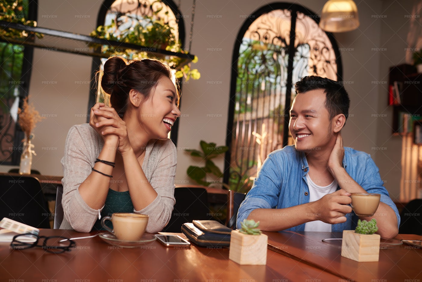 Young Couple Flirting In Cafe: Stock Photos
