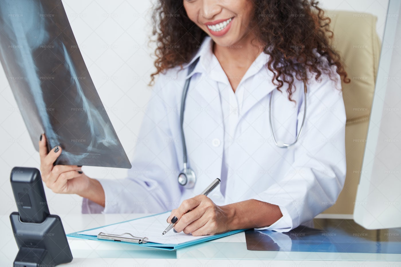 Female Doctor Writing A Conclusion Stock Photos Motion Array