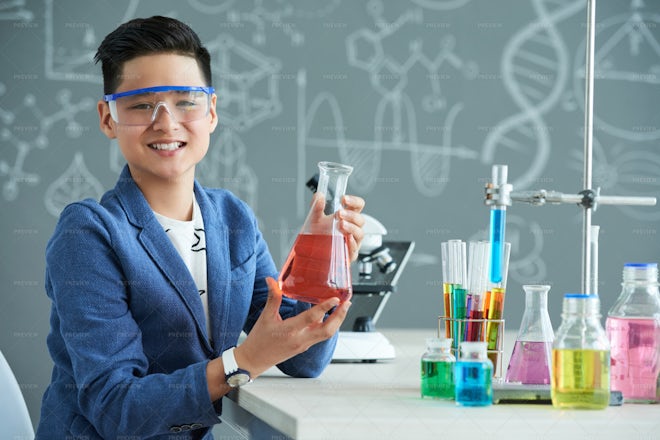 Posing For Photography At Chemistry... - Stock Photos | Motion Array