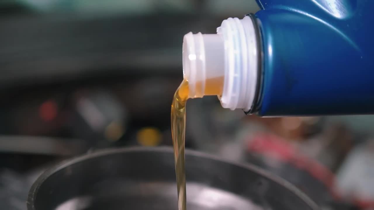 Pouring Machine Oil Stock Video Motion Array