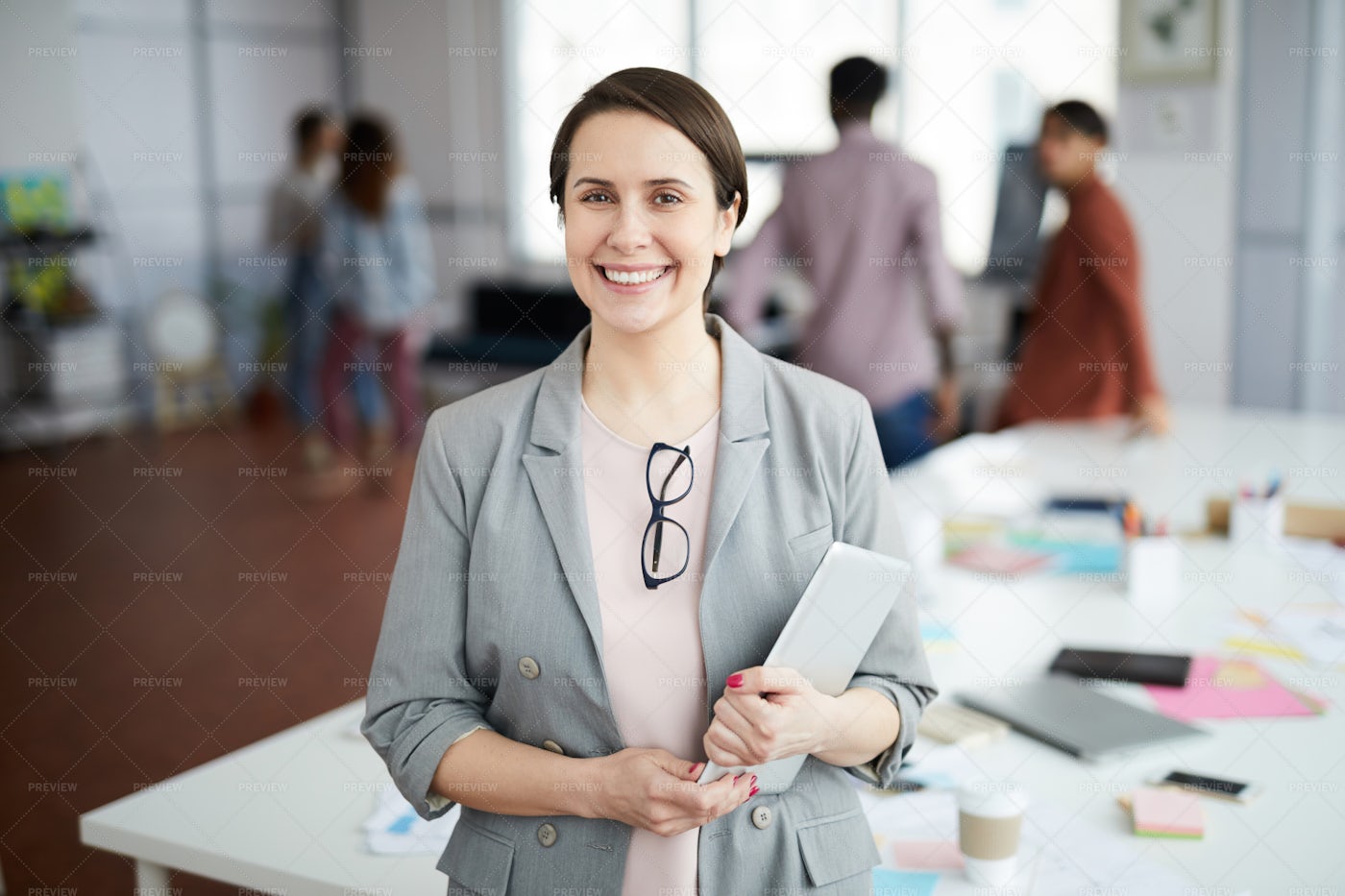 Smiling Businesswoman Posing In...: Stock Photos