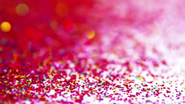 Red Glitter Falling On White: Stock Video