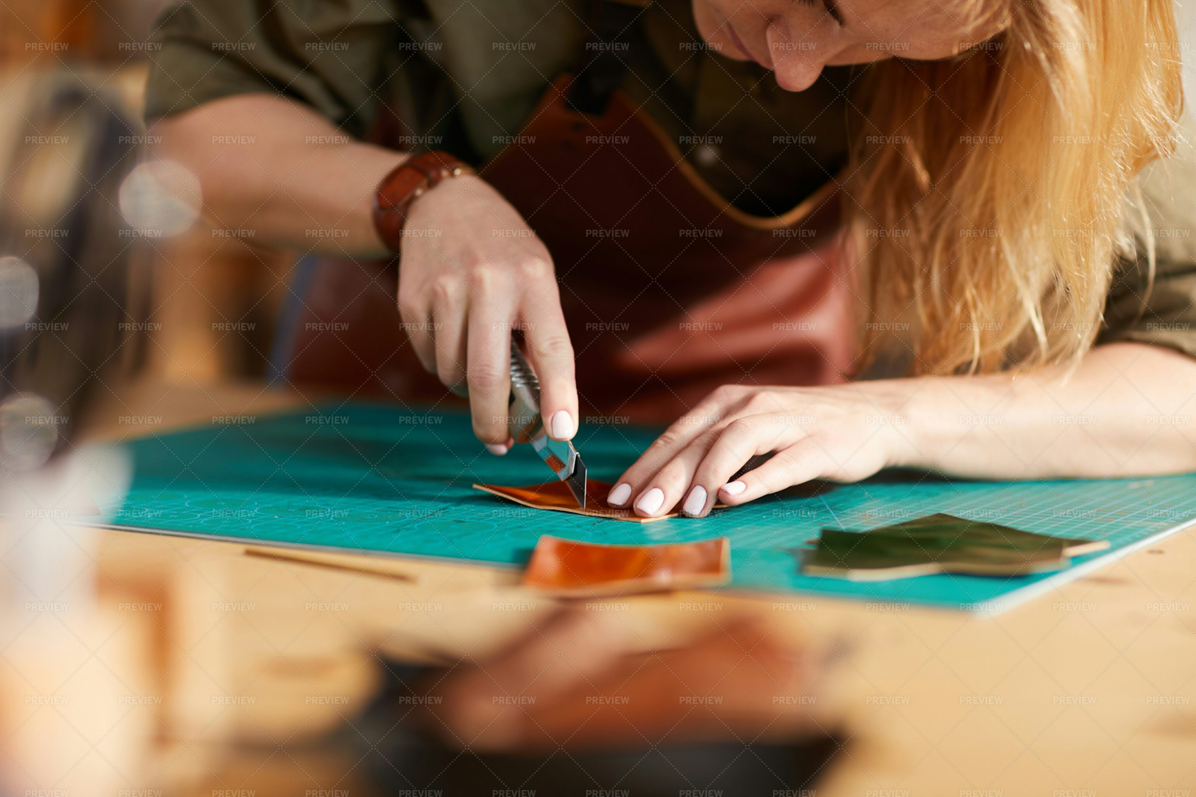 leather-craftsman-closeup-stock-photos-motion-array