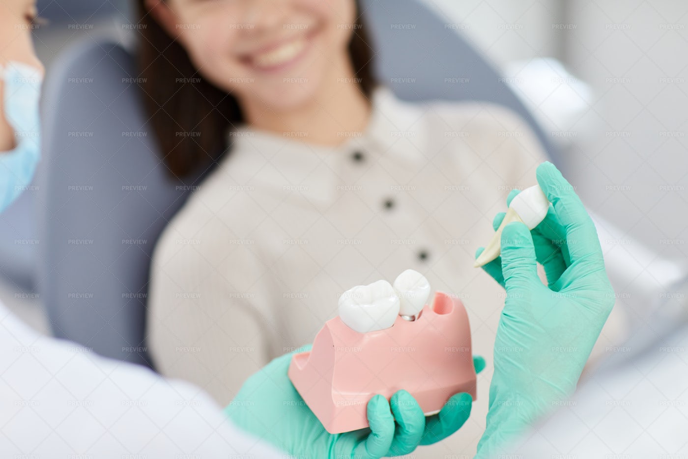 Dentist Explaining Tooth Extraction: Stock Photos