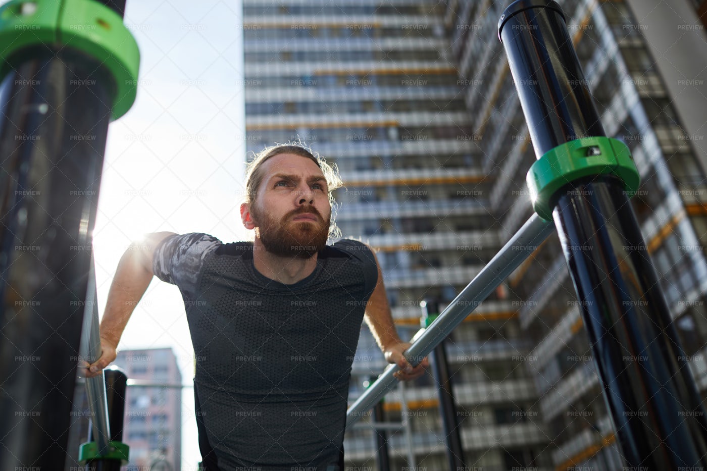 strong-man-doing-pull-ups-stock-photos-motion-array