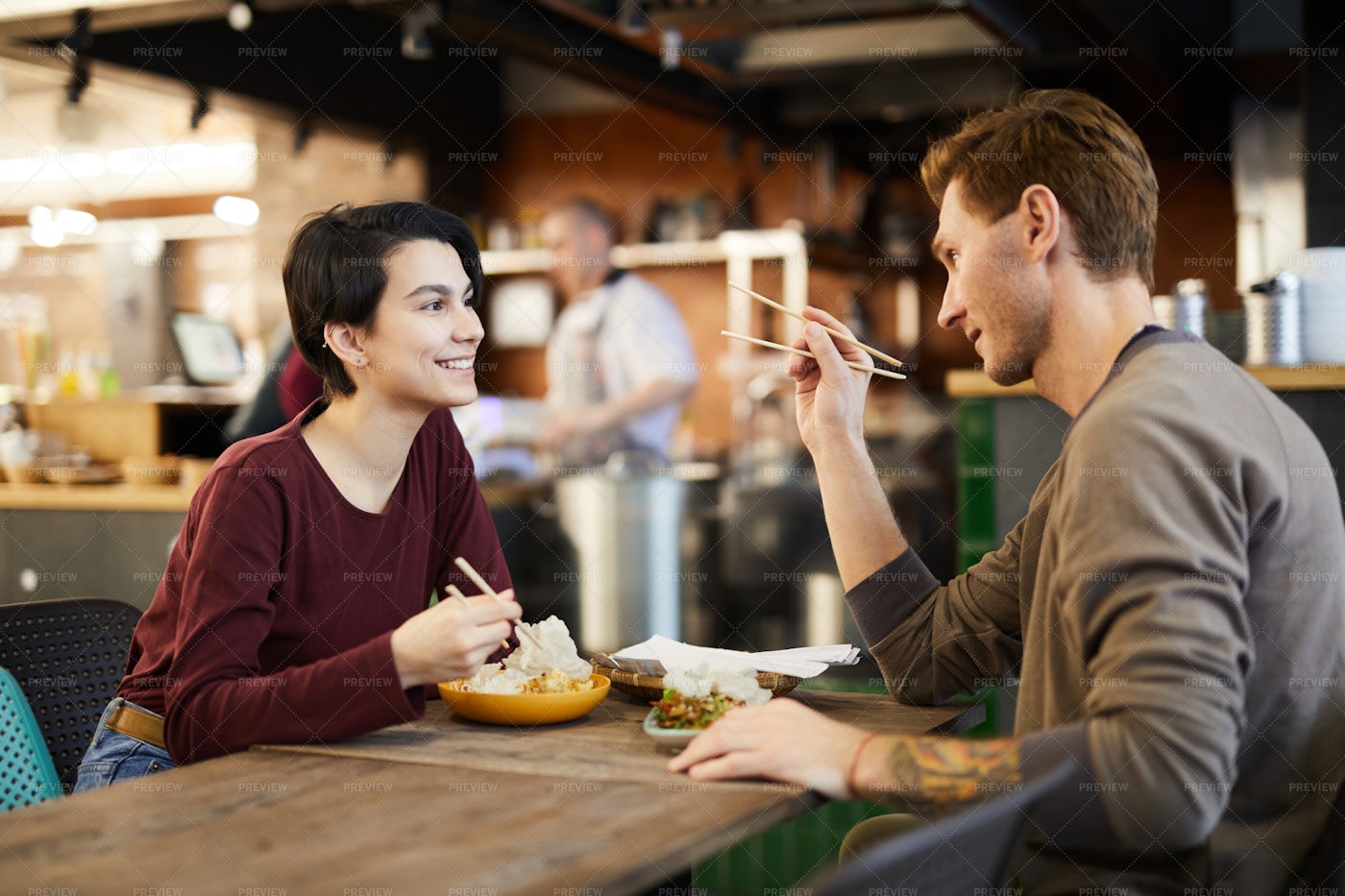 Couple In Chinese Food Restaurant: Stock Photos