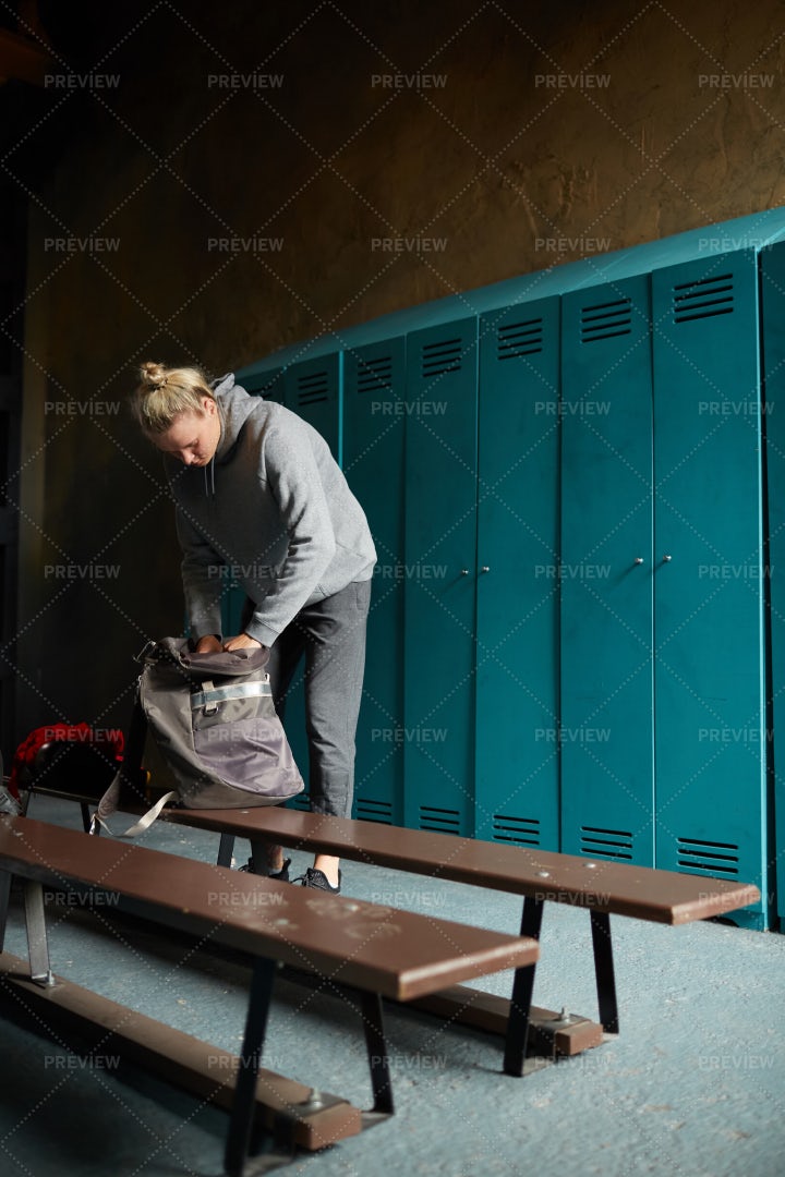 Woman Dressing In Sports Club: Stock Photos
