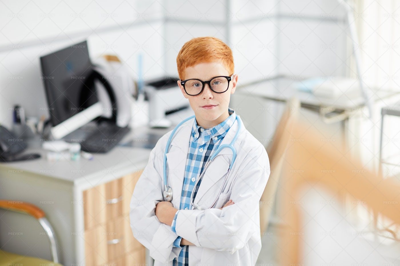 Boy Playing Doctor In Clinic: Stock Photos