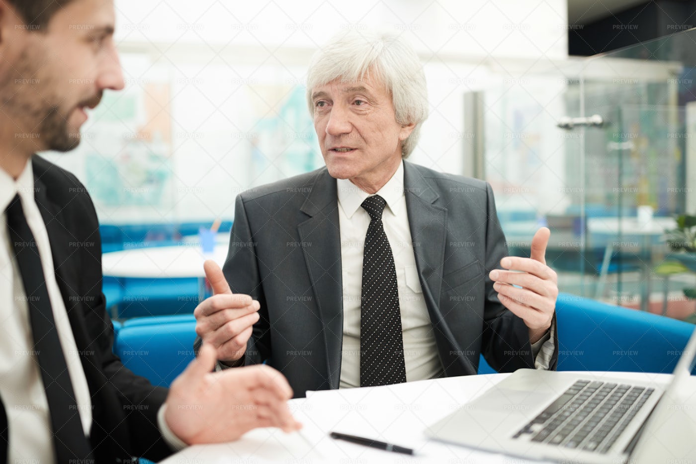 Senior Businessman In Meeting: Stock Photos