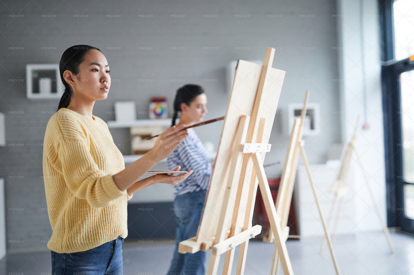 Girl Painting: Stock Photos