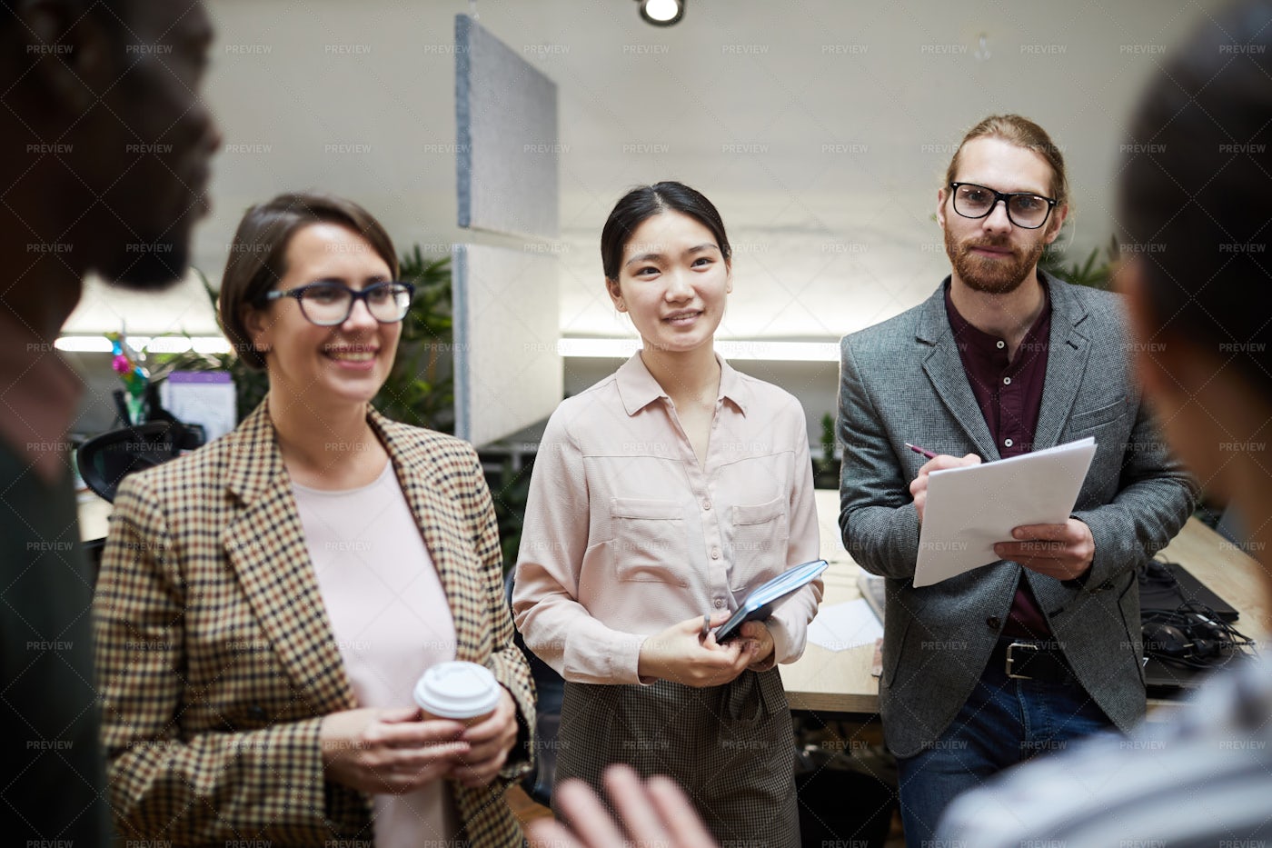 Business People Talking In Office: Stock Photos