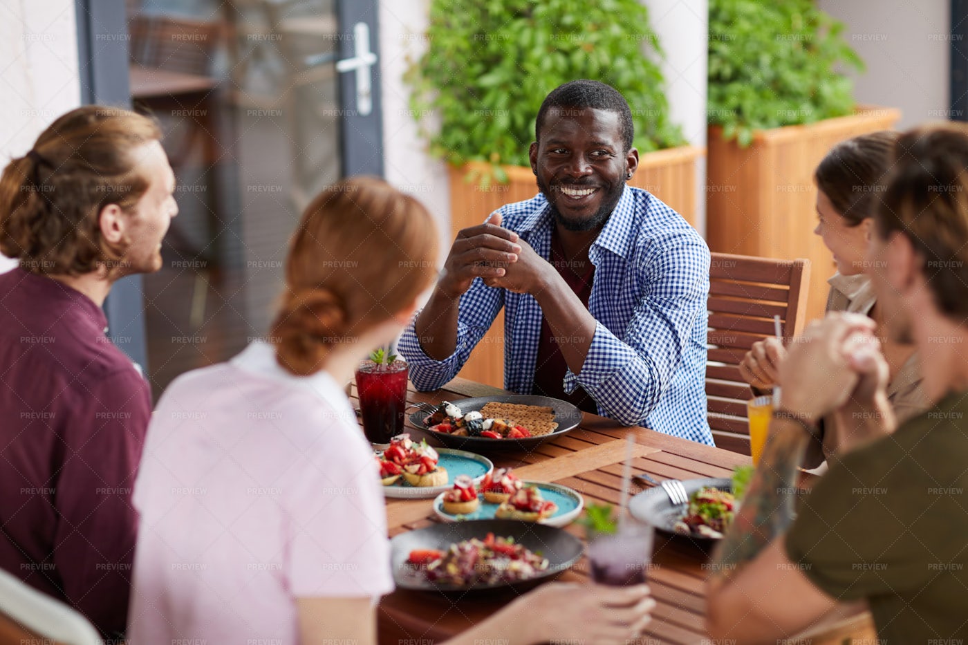Diverse Group Of Friends Enjoying...: Stock Photos