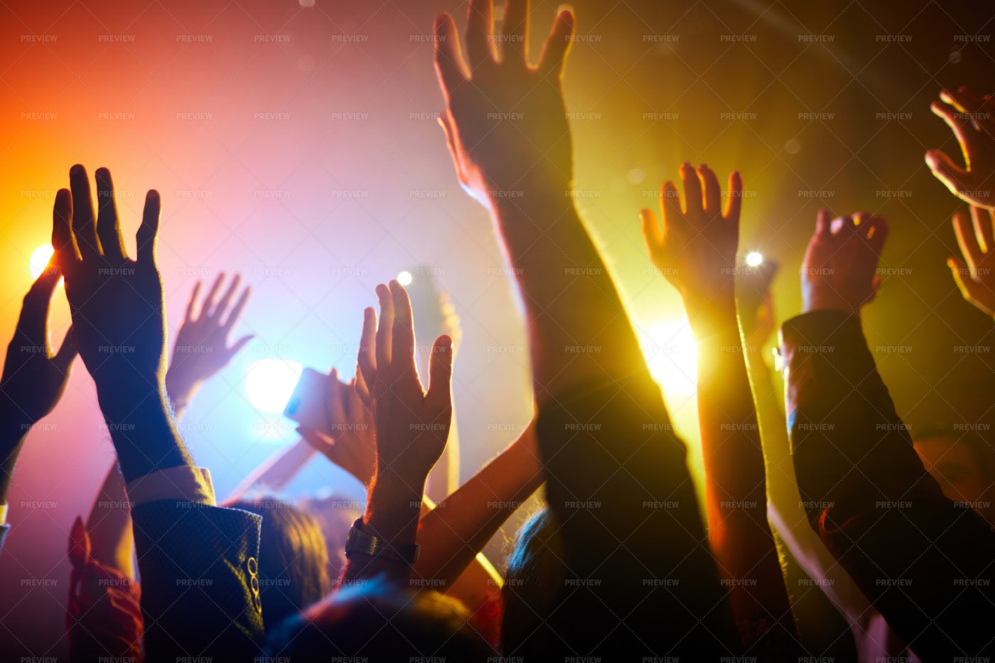 Waving Hands In Air During...: Stock Photos