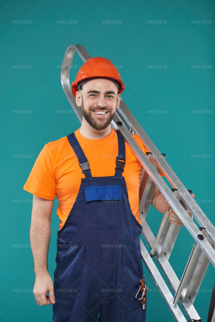 Young Man With Portable Ladder: Stock Photos