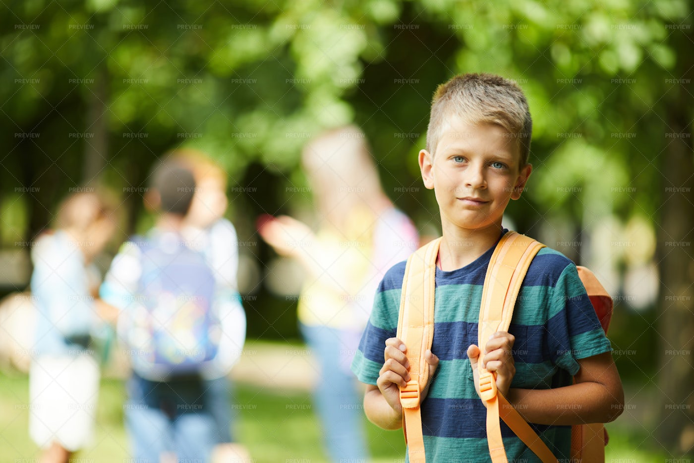 Schoolboy With Orange Backpack: Stock Photos