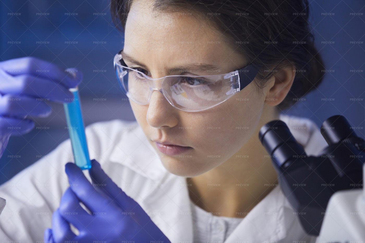 Female Scientist Studying Test...: Stock Photos