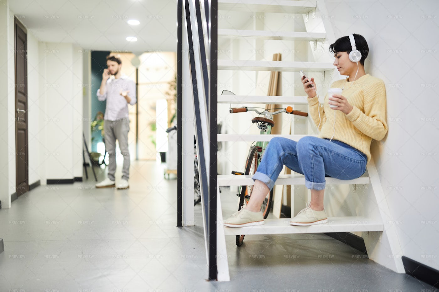 Hipster Girl In Headphones Choosing...: Stock Photos