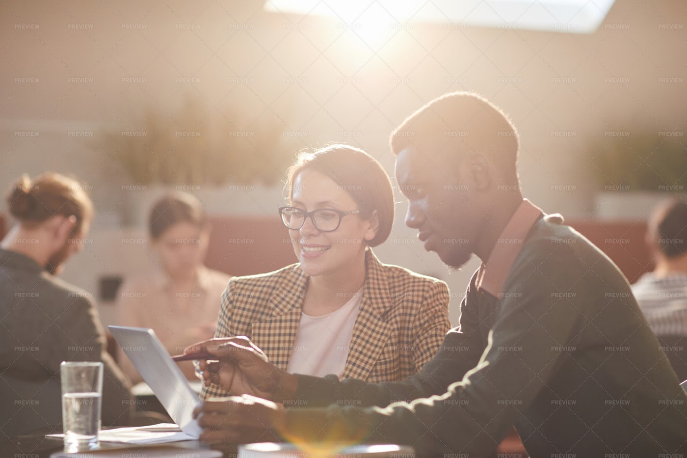 Business Meeting In Sunlight: Stock Photos