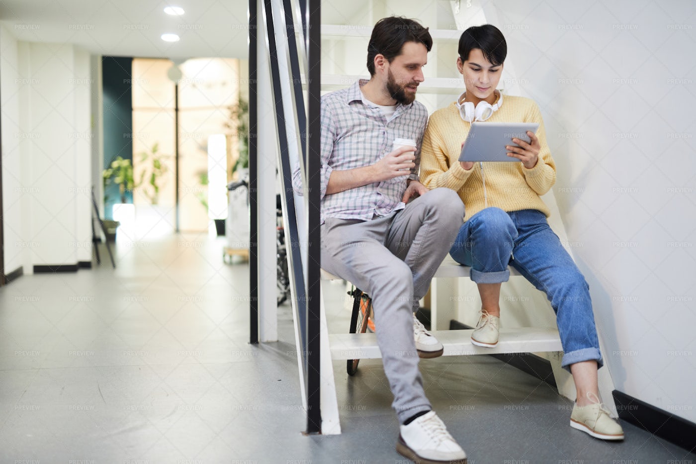 Modern Colleagues Analyzing Online...: Stock Photos