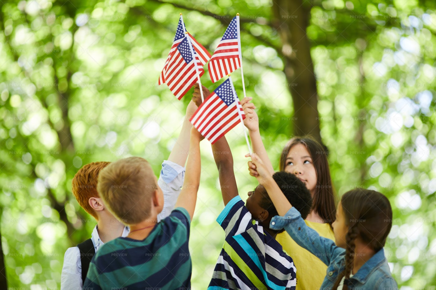 Children Raising Us Stick Flags...: Stock Photos
