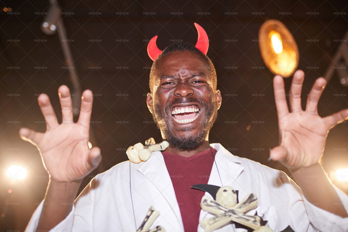 African Man In Devil Costume On...: Stock Photos