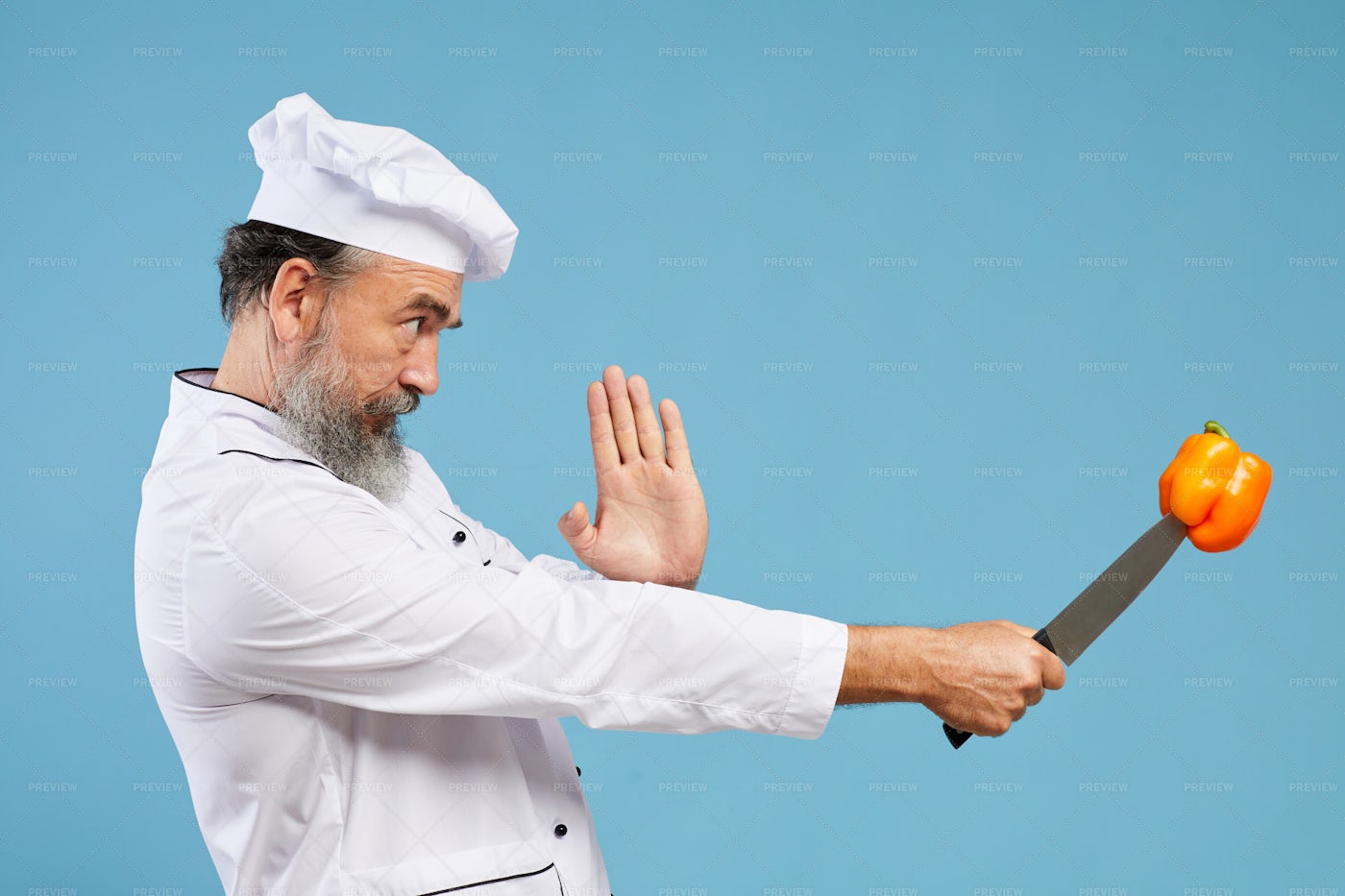 Senior Chef En Garde: Stock Photos