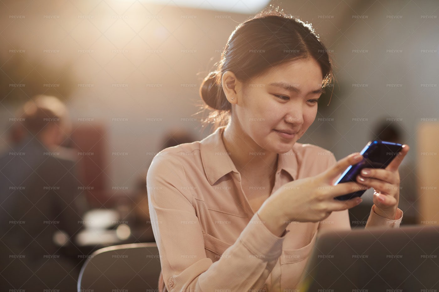 Asian Woman Using Smartphone In...: Stock Photos