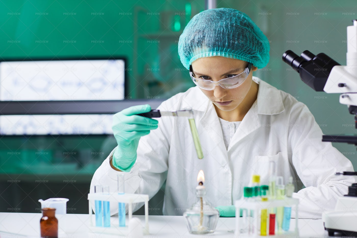 Female Scientist Working On...: Stock Photos