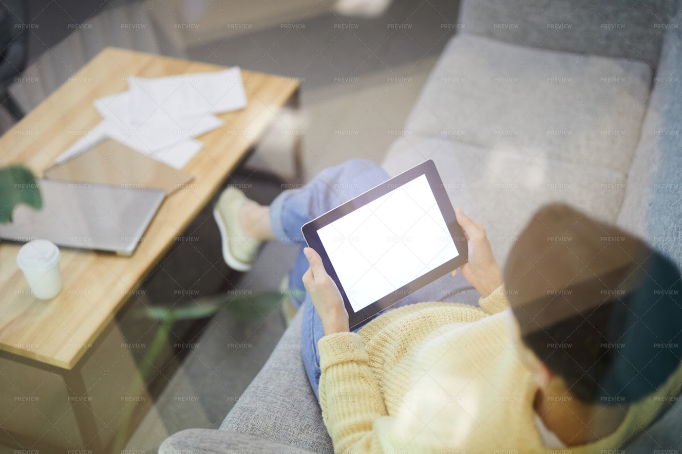 Modern Woman Watching Video On...: Stock Photos