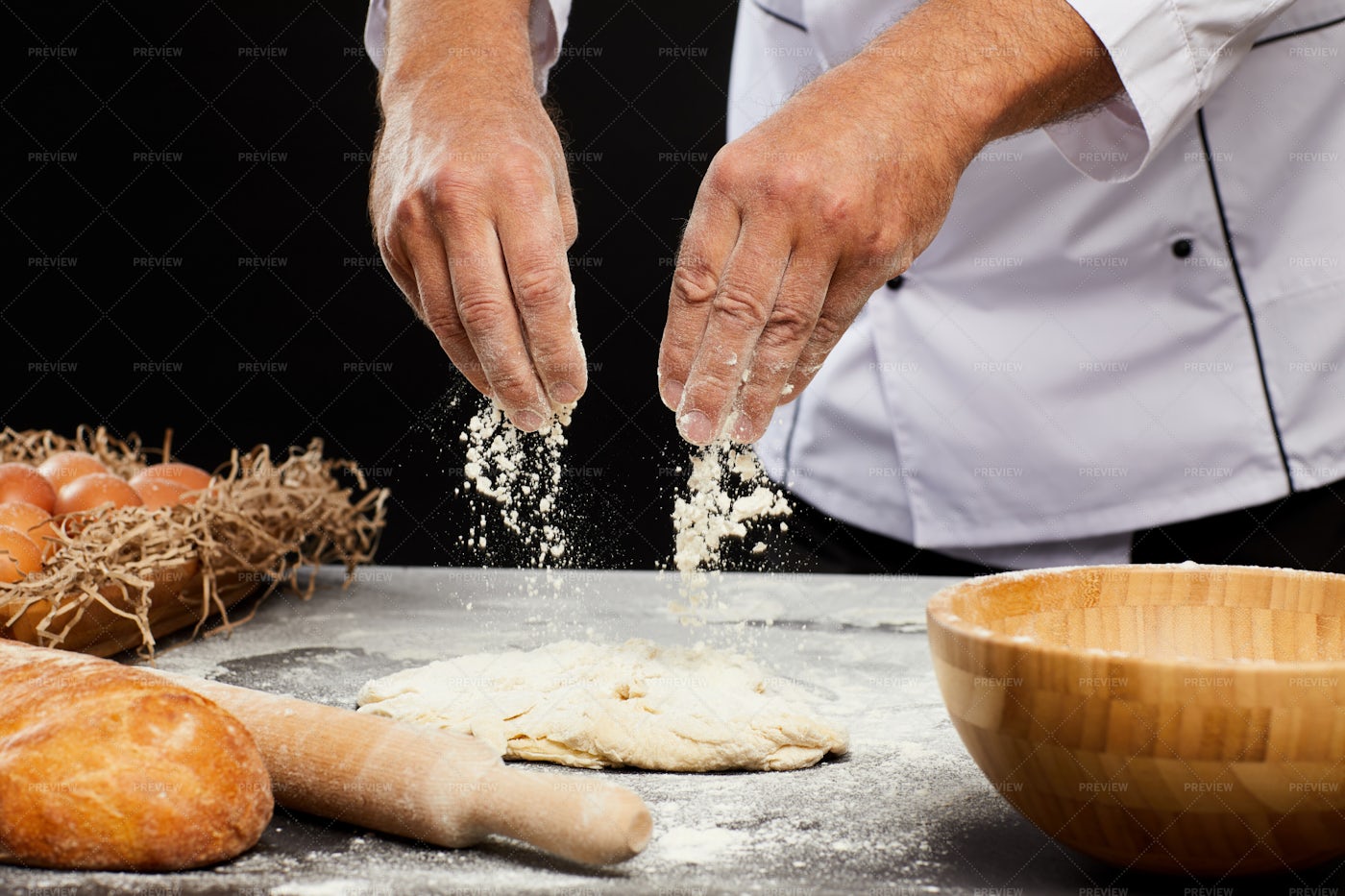 Chef Baking Bread Against Black...: Stock Photos