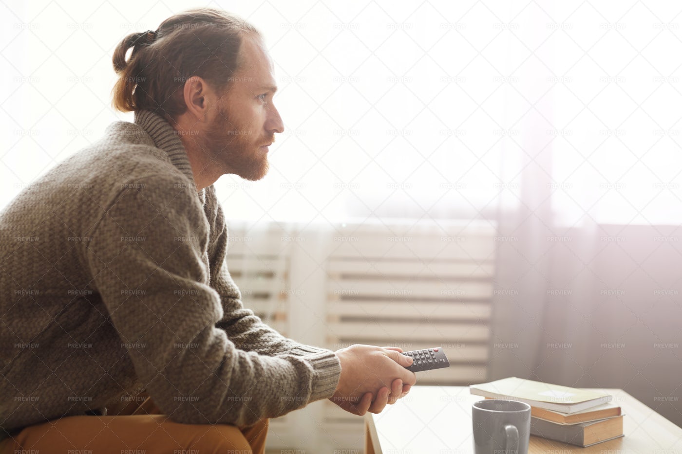 Handsome Man Watching TV: Stock Photos