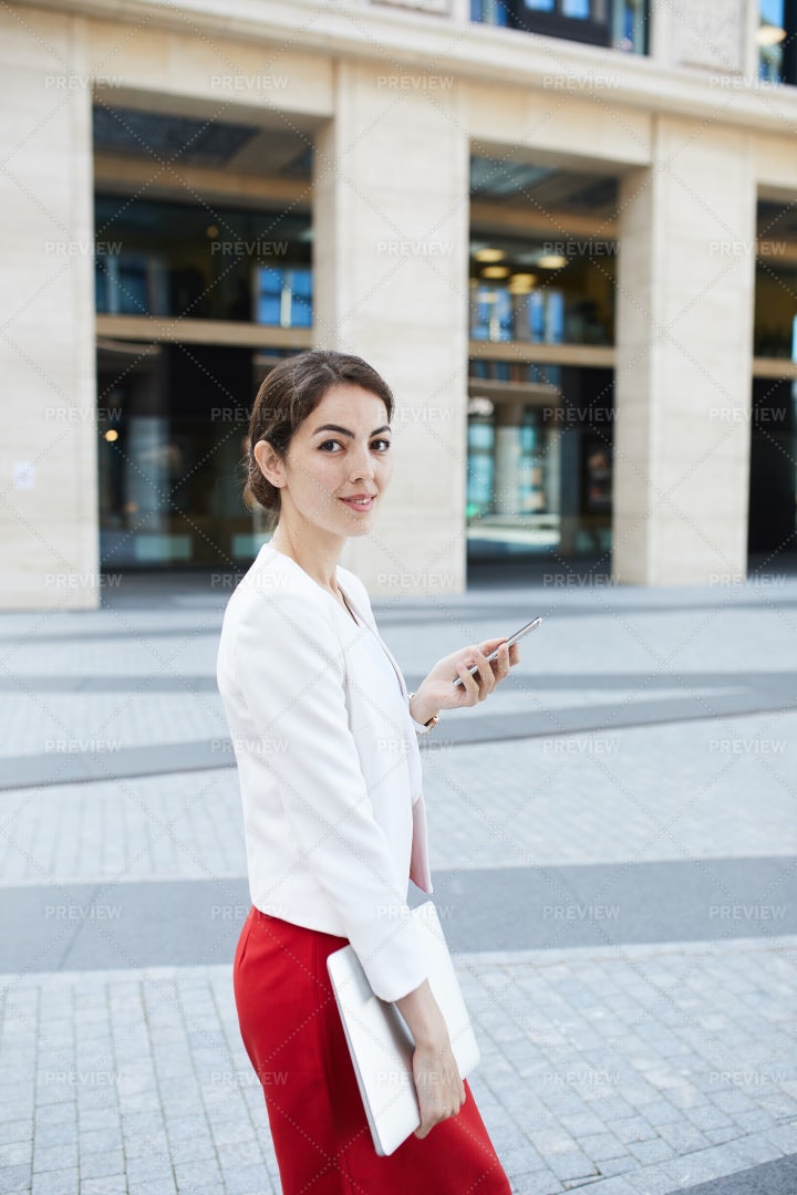 Elegant Woman Walking In City: Stock Photos