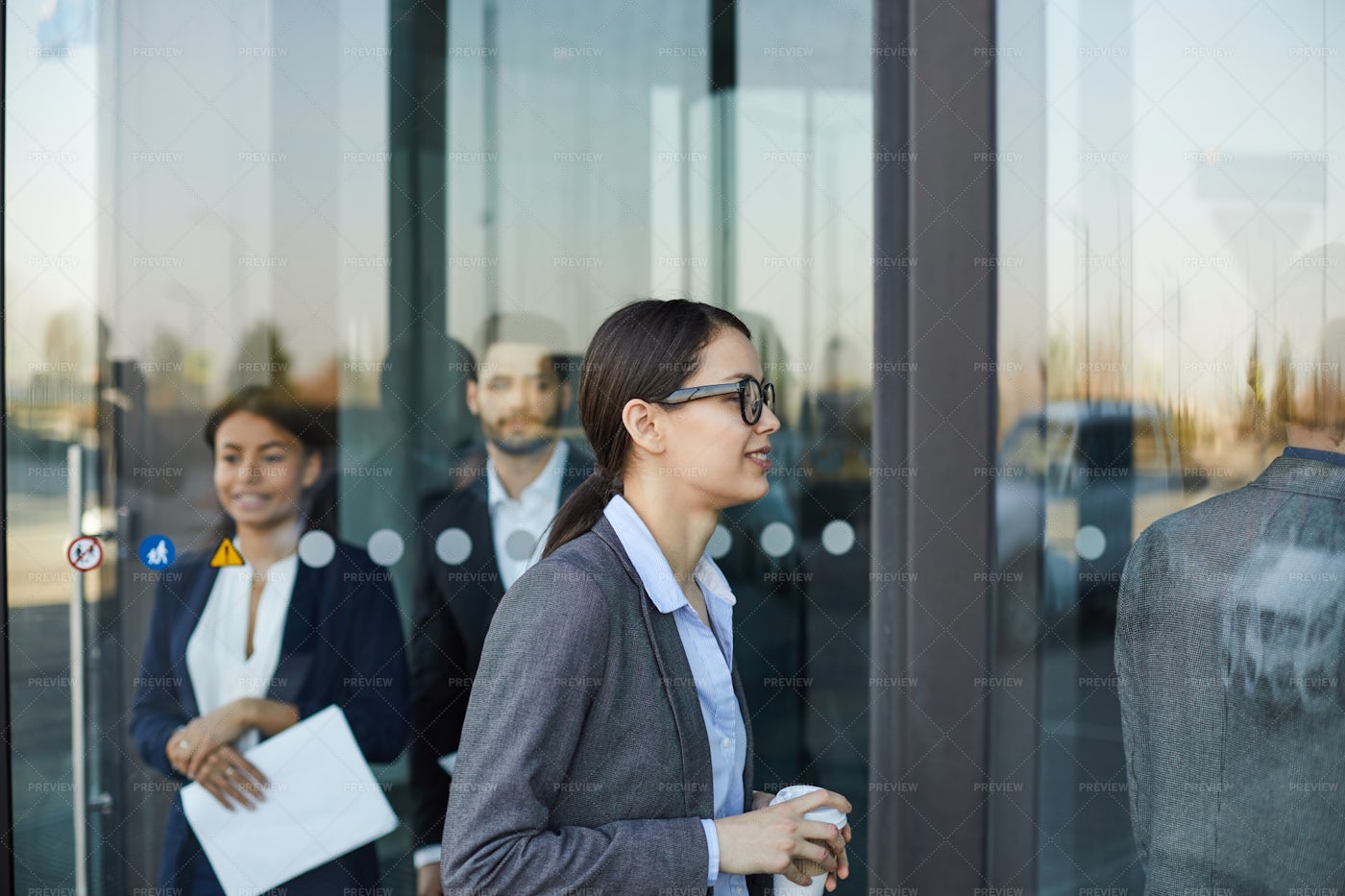 Business People Walking Through...: Stock Photos
