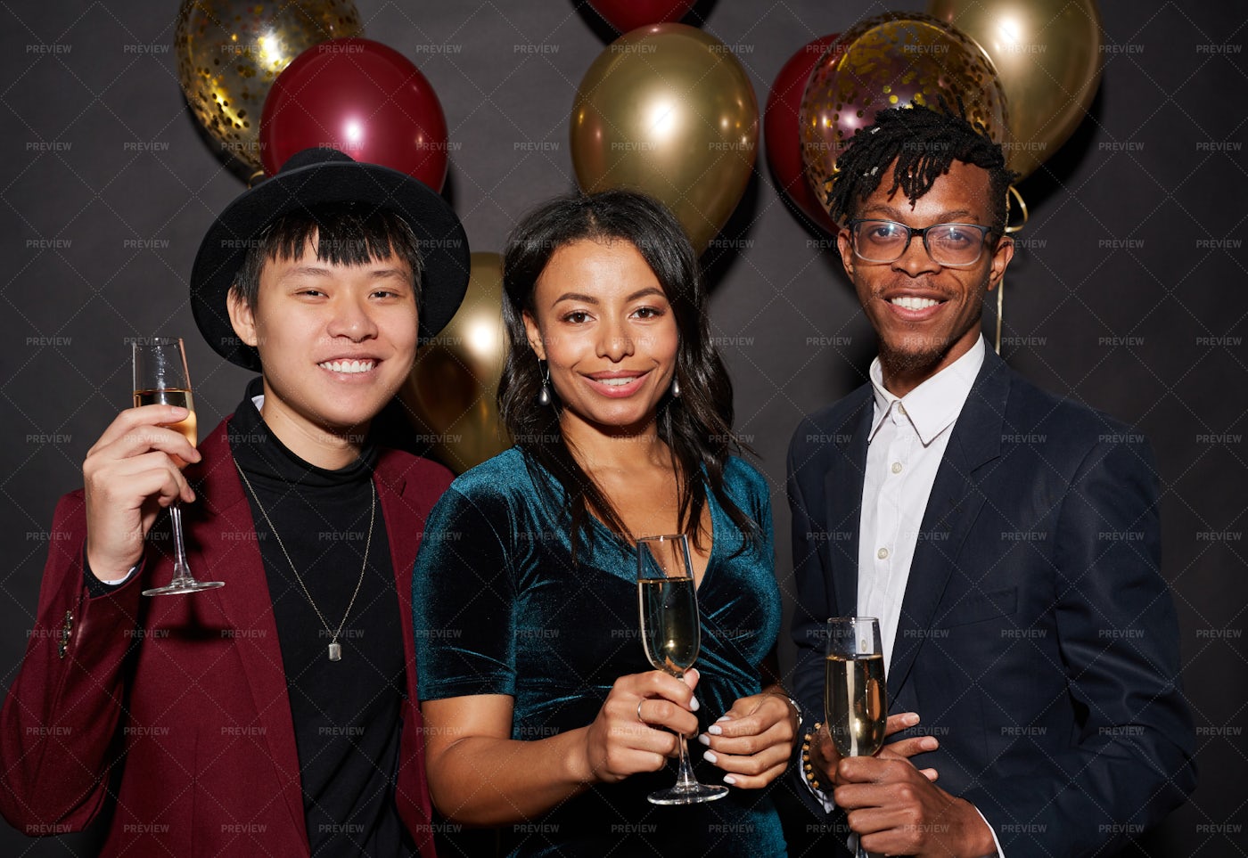 Ethnic Young People Posing At Party: Stock Photos