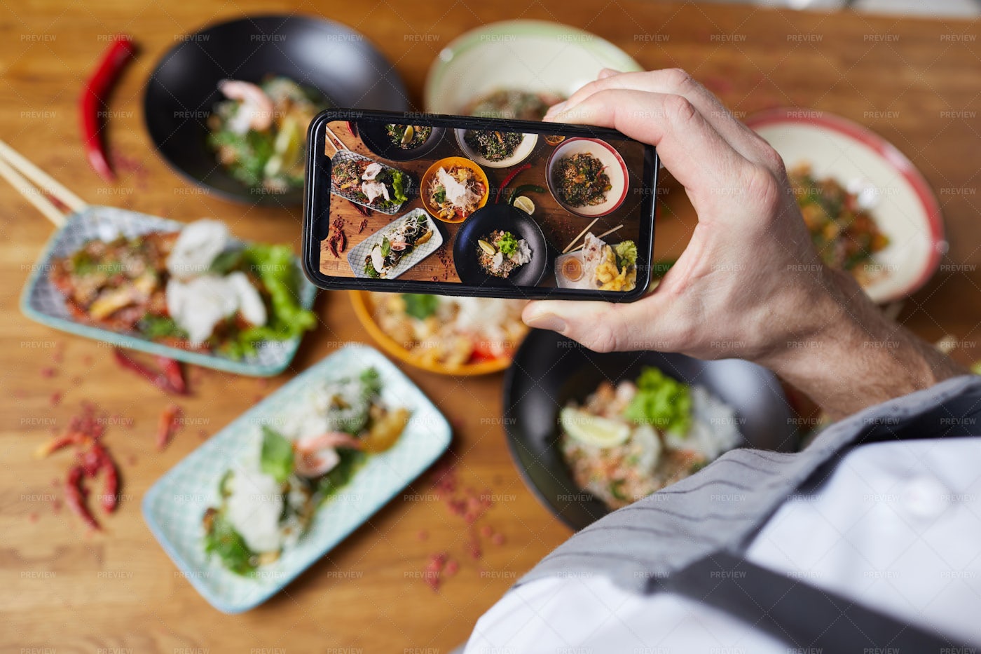 Taking Smartphone Photo Of...: Stock Photos