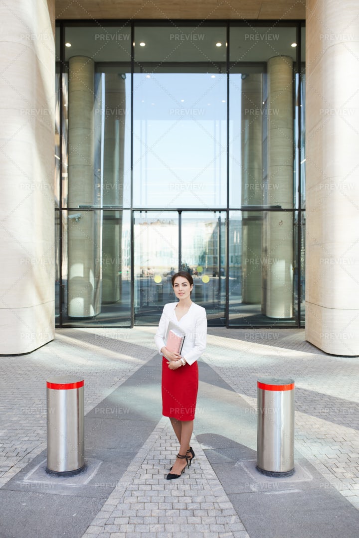 Businesswoman Posing By Entrance: Stock Photos