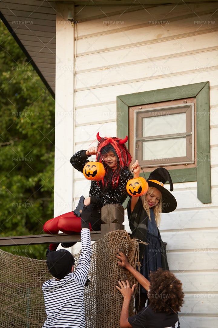 Kids Running Away On Halloween: Stock Photos