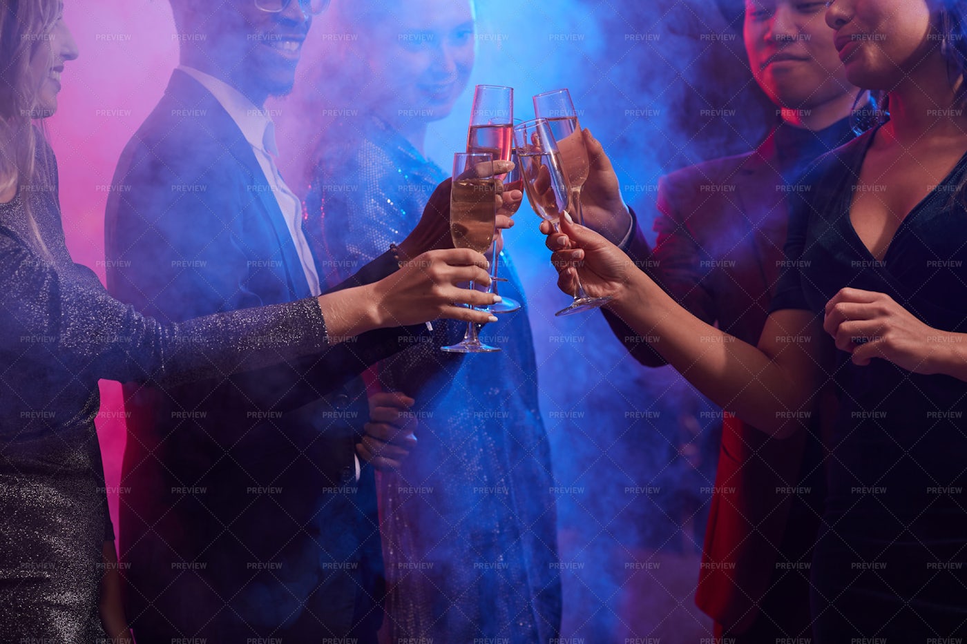 People Enjoying Party In Smoky...: Stock Photos