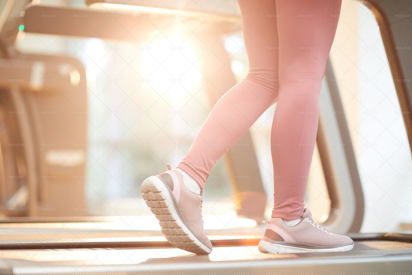 Woman Running On Treadmill: Stock Photos