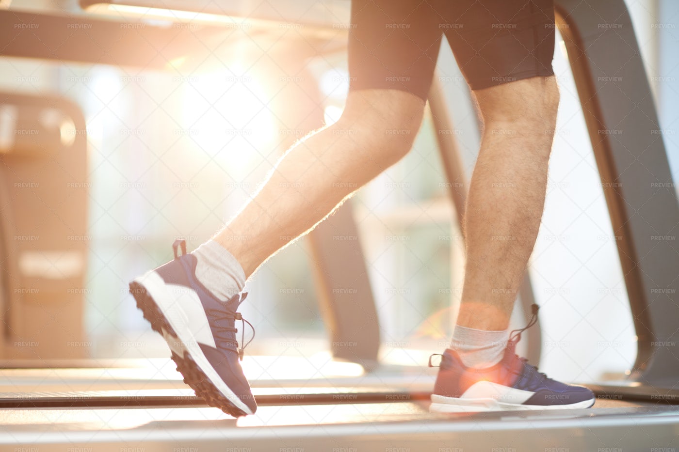 Male Legs Running On Treadmill: Stock Photos
