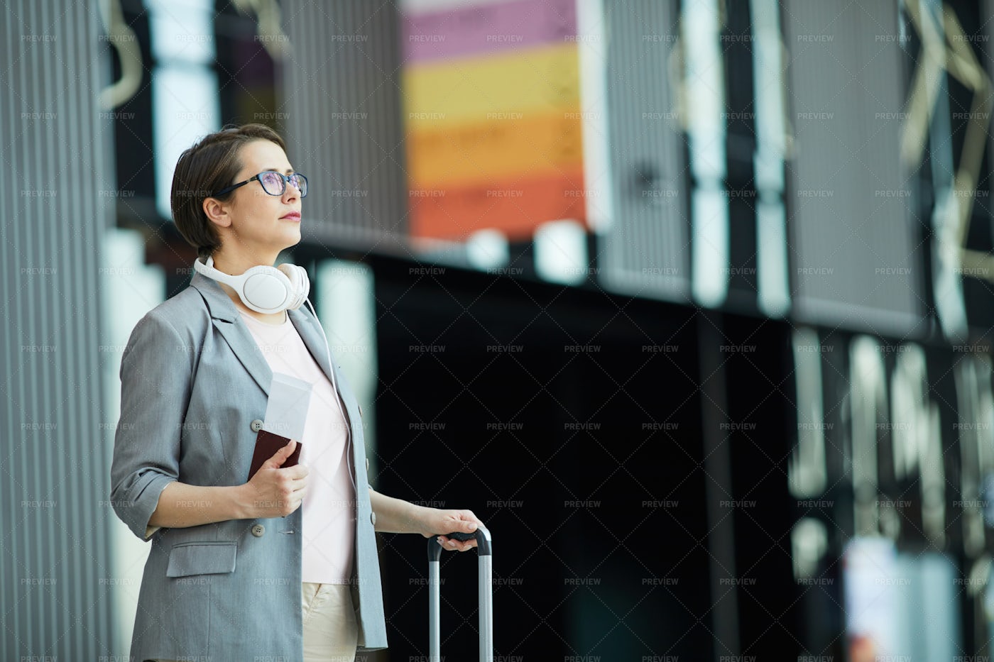 Modern Woman Reading Flight...: Stock Photos